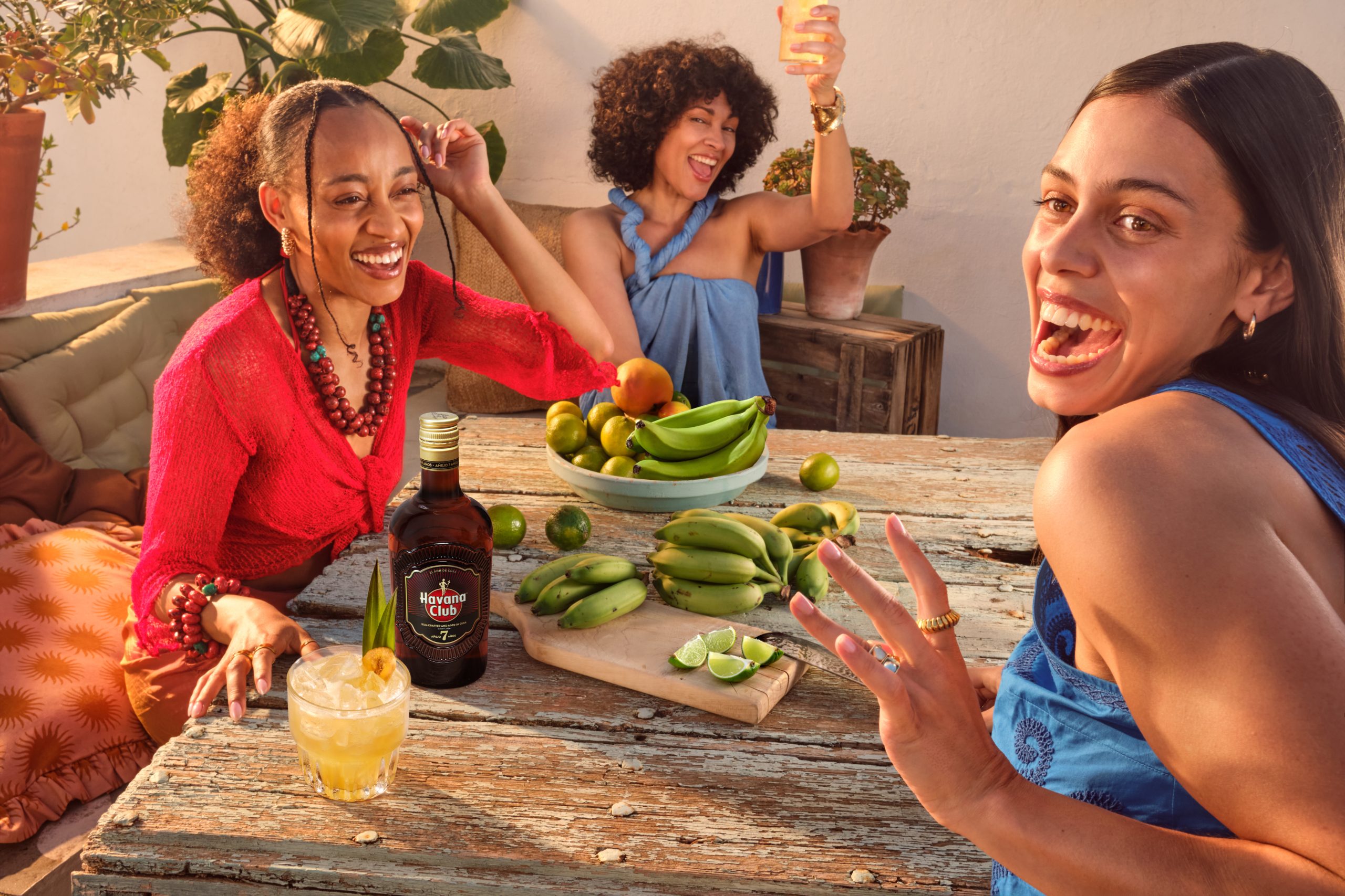 women smiling banana mai tai cocktail havana club 7
